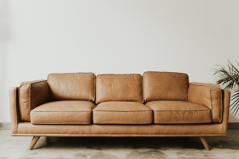 Professional sofa cleaning showing before and after results